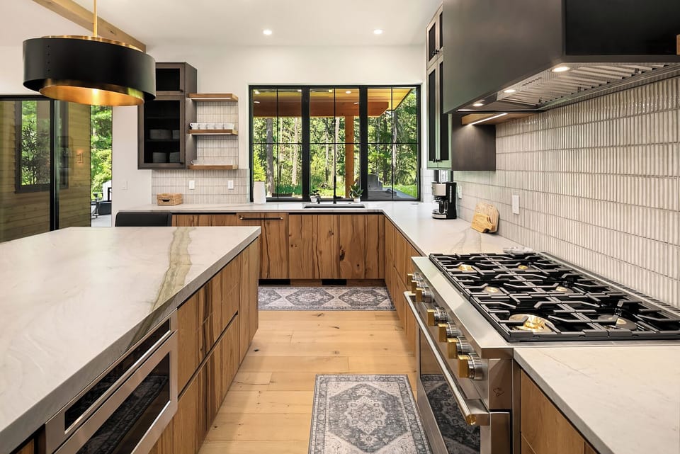 Grand Mountain Estate. - Fully stocked chefs kitchen with 6 burner monogram cooktop!