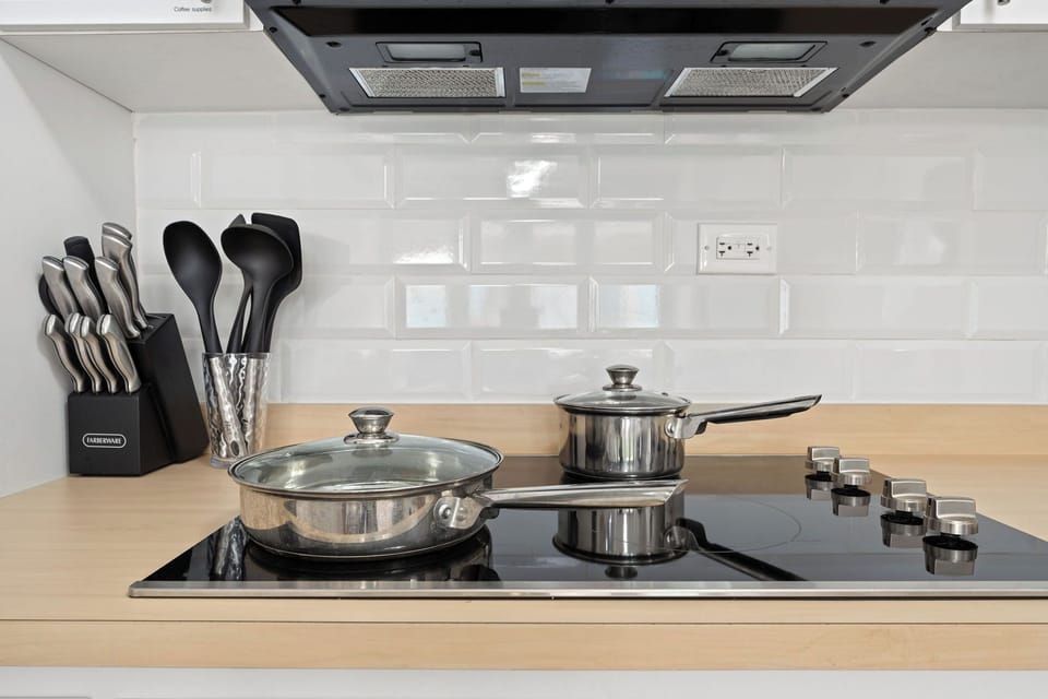 Kitchen: Cook up your next adventure with modern appliances and sleek design!