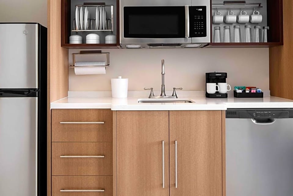 Enjoy quick snacks anytime with convenient in-room kitchenette.