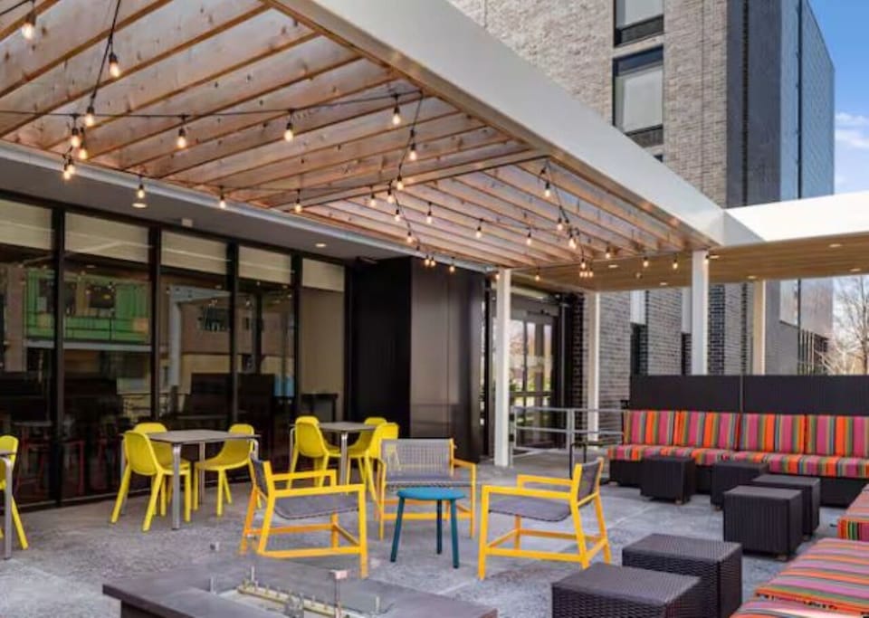 Gather outside under twinkling lights for relaxed evening chats.