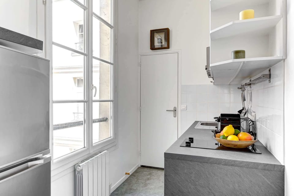 The kitchen is fully equipped to prepare a simple meal 