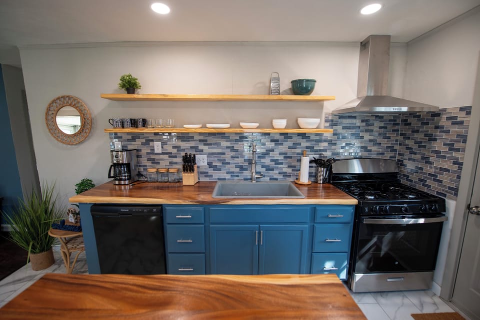 Fully stocked kitchen to include air fryer, blender, coffee station...
