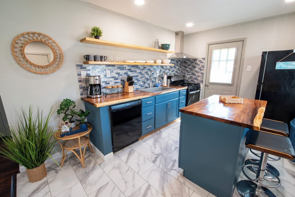 Fully stocked kitchen to include air fryer, blender, coffee station...