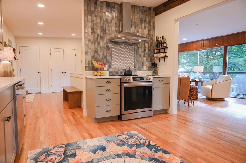 Wide open main level floor plan doesn’t leave the cooks behind!