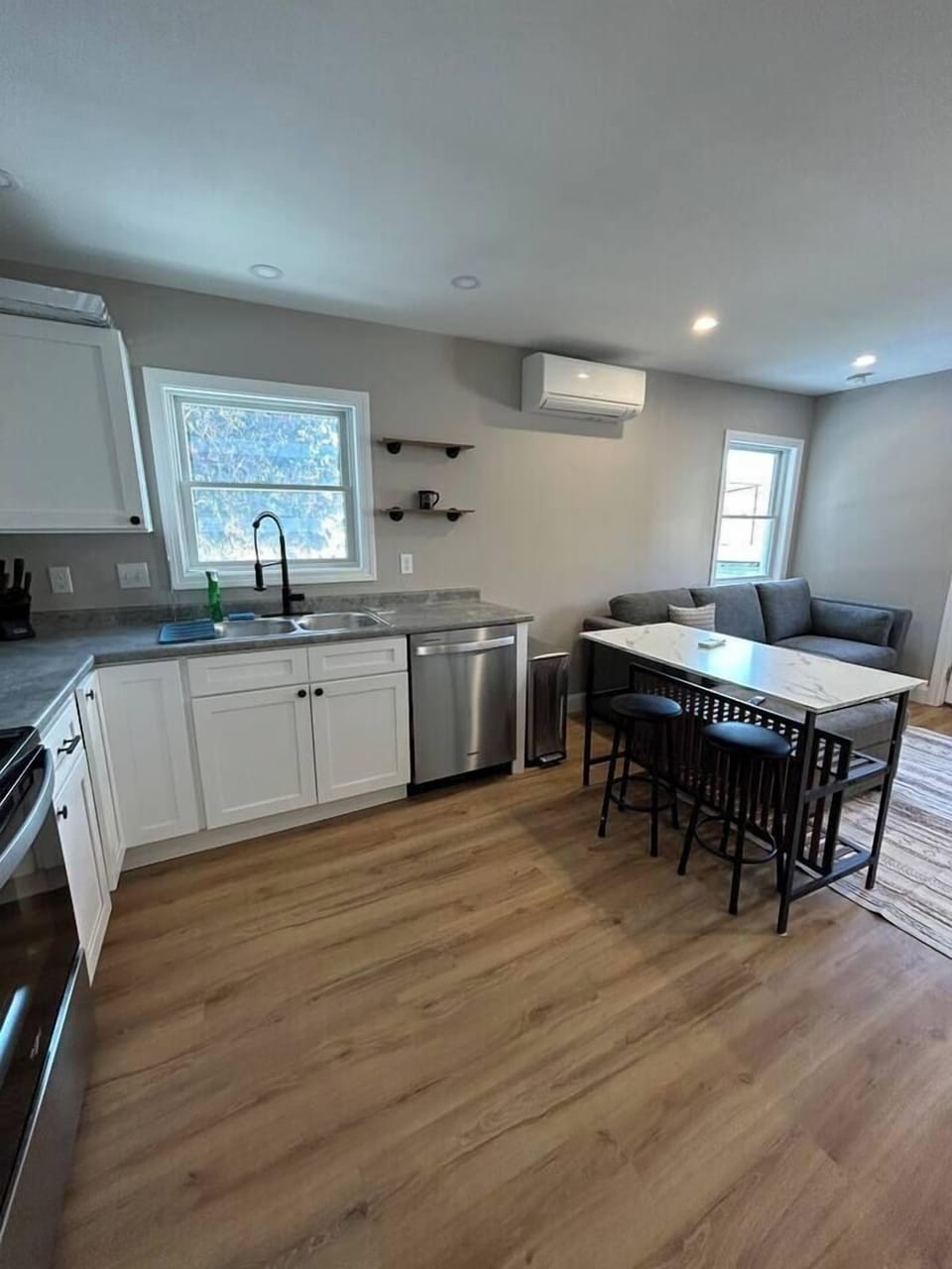 Kitchen flows into the living room. Heat pumps in each bedroom and the living space upstairs for your comfort.