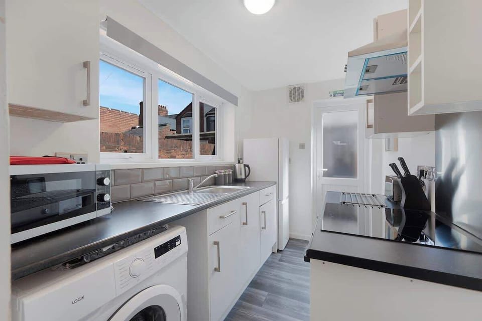 Family-friendly kitchen oasis equipped with all essentials, including a washer & dryer, oven, fridge and full cookware set. Plus, thoughtful touches like children's dinnerware ensure everyone feels right at home in this cozy culinary haven.
