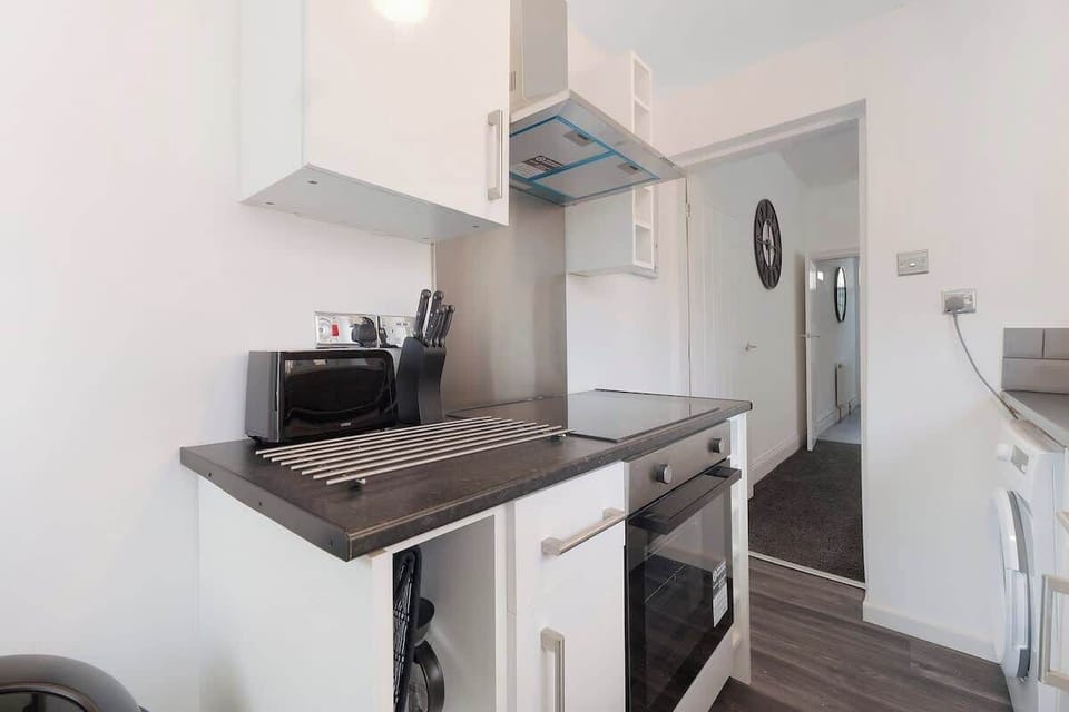 Family-friendly kitchen oasis equipped with all essentials, including a washer & dryer, oven, fridge and full cookware set. Plus, thoughtful touches like children's dinnerware ensure everyone feels right at home in this cozy culinary haven.
