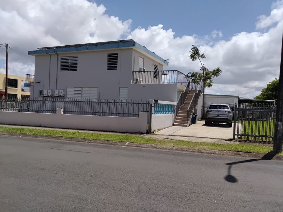 Exterior Side View of Home and 2nd Floor Entrance 
