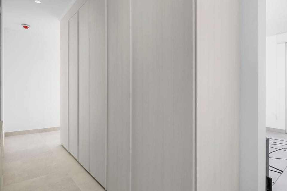 Spacious built-in closets keep your belongings neatly organized, with sleek modern doors and plenty of storage to make your stay effortless.