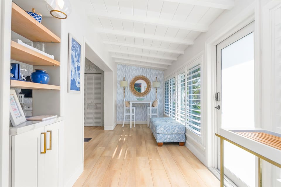 A grand hallway entrance with plenty of space to drop your bags and start your vacation.