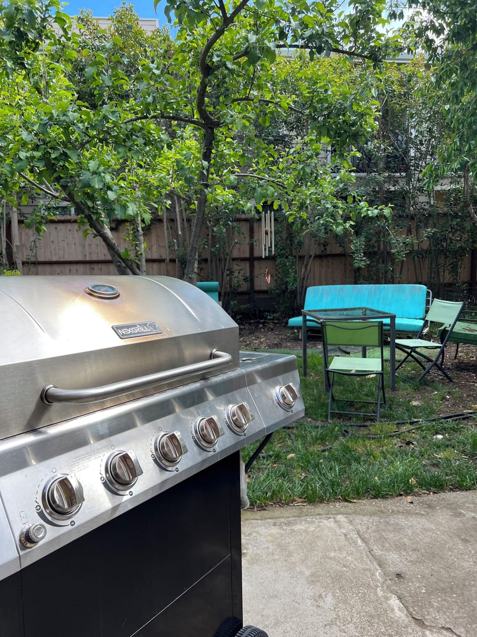 BACKYARD 
This backyard features a BBQ station and a comfy seating for relaxing.