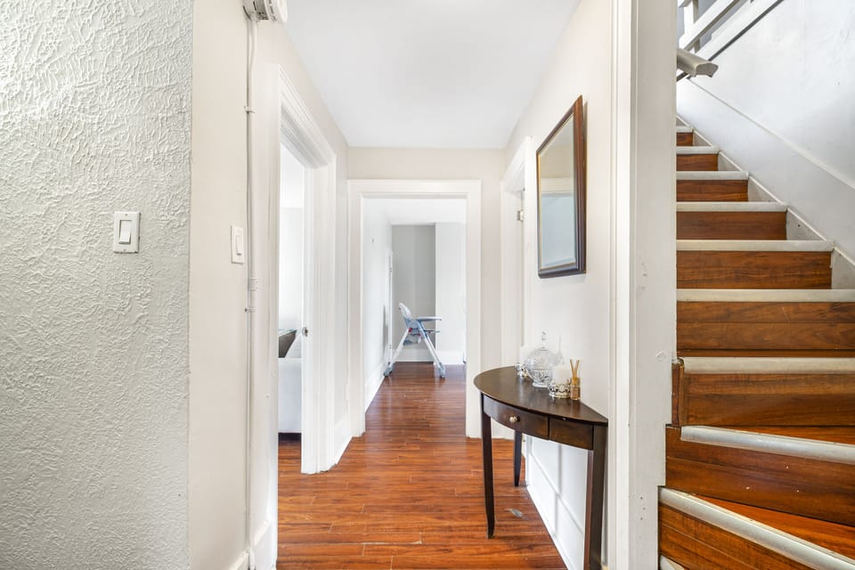 Hall with stairs leading to loft