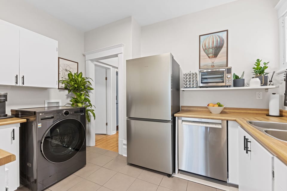 Washer/dryer with hypoallergenic laundry sheets provided.
