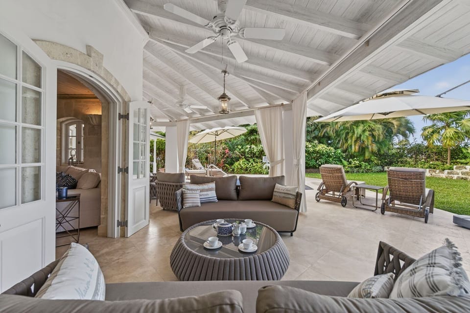 Covered patio with comfortable lounge spaces