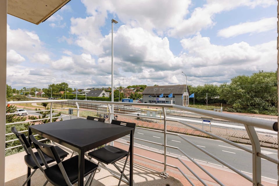 Sunny terrace with view to the main road