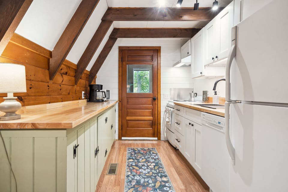 The kitchen is fully equipped with all the essentials, like cookware, plates, moka espresso pot, tea kettle, drip coffee, utensils, and a dishwasher! The cabinets are brand new as of 2025!