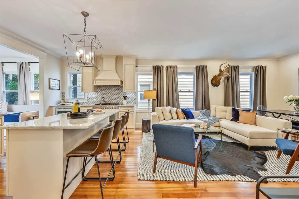 Unit 3 | Open Concept Living Room | XL Flat Screen TV | Hardwood Floors | Third Floor
