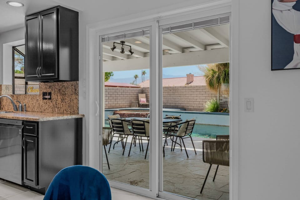 Sliding doors leading to outside entertainment area