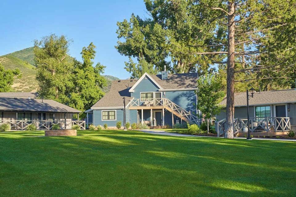 Arrive to manicured lawns and charming lodge-style buildings.