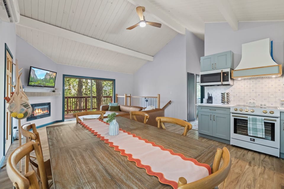 Dining table can also expand with a leaf to seat eight.