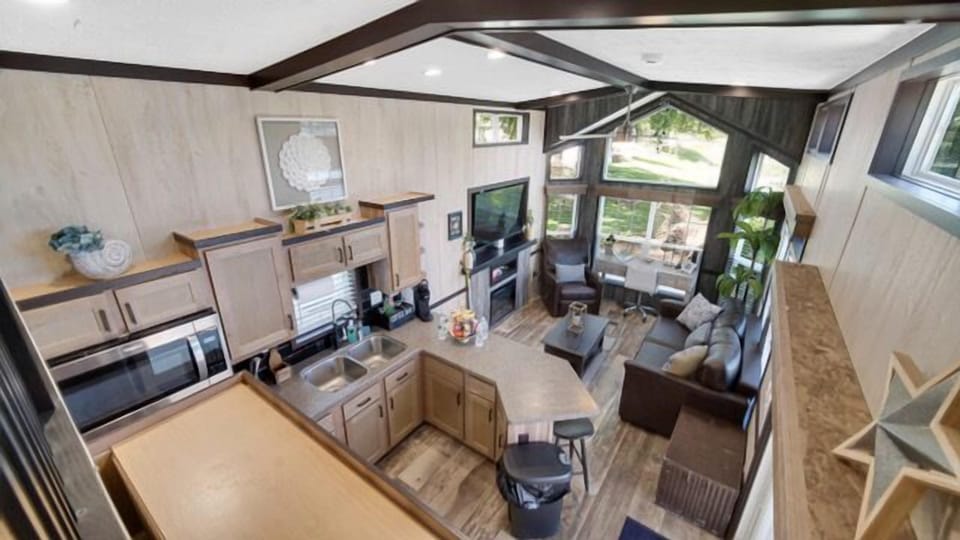 Aerial perspective of the kitchen and living space, designed for easy living and gathering.