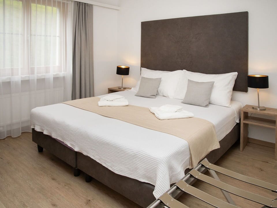 Furniture, Interior Design, Flooring, Floor, Bed, Bedroom, Wood, Room, Textile, Linens