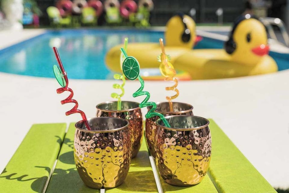 Enjoy your favorite refreshing beverage soaking up the sun poolside.