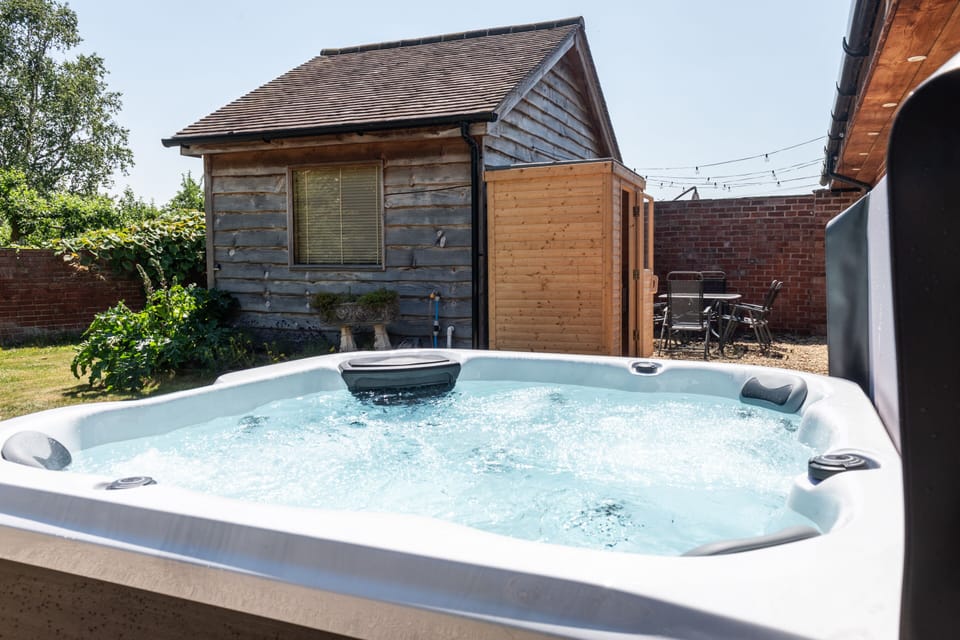 Private hot tub & sauna in your own peaceful garden — perfect for relaxing under the stars