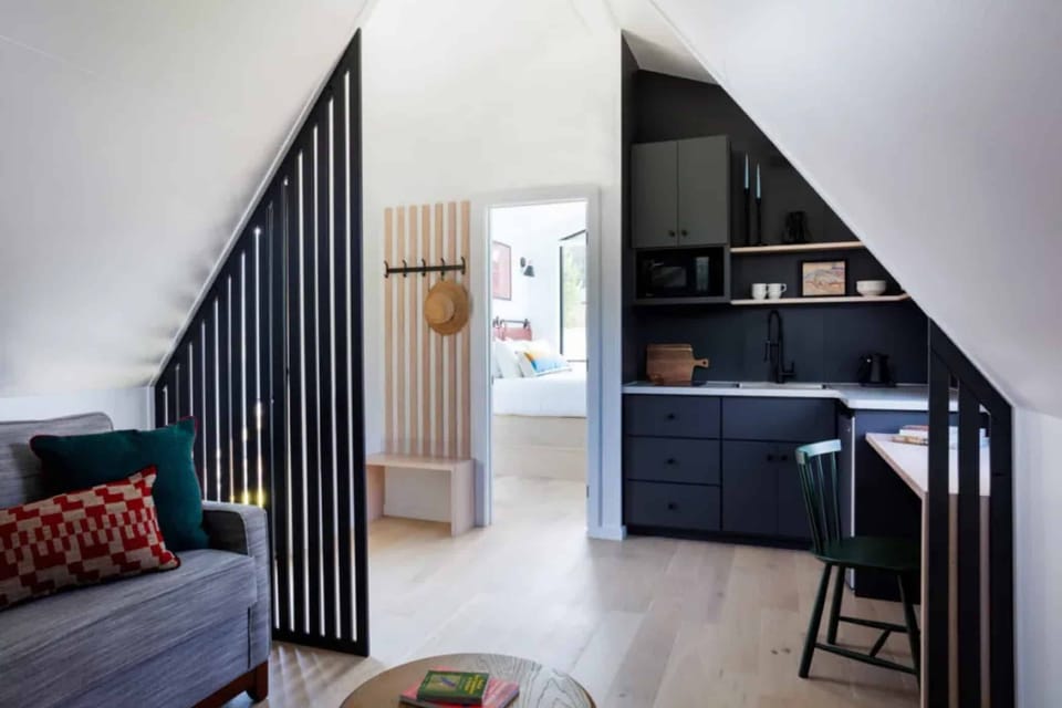 Whip up easy meals in the sleek, tucked-away kitchenette.