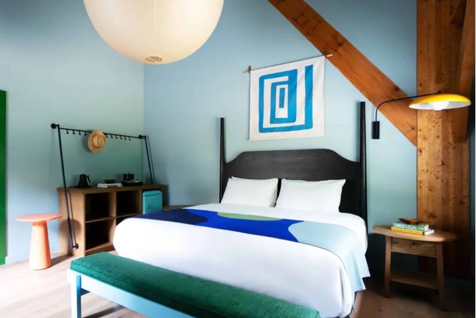 Drift into deep sleep in this design-forward king retreat.