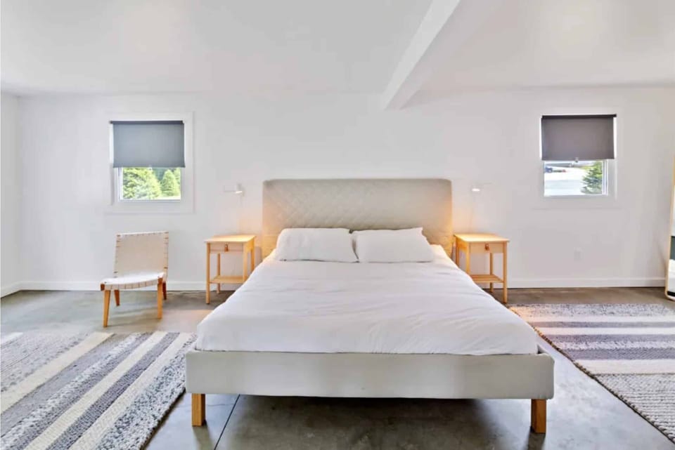 Stretch out on the plush bed for a deep, quiet sleep.