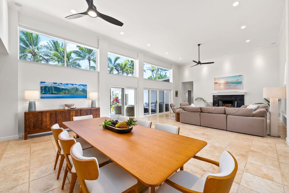 Gather around the spacious table with seating for eight and views of the lanai and pool.