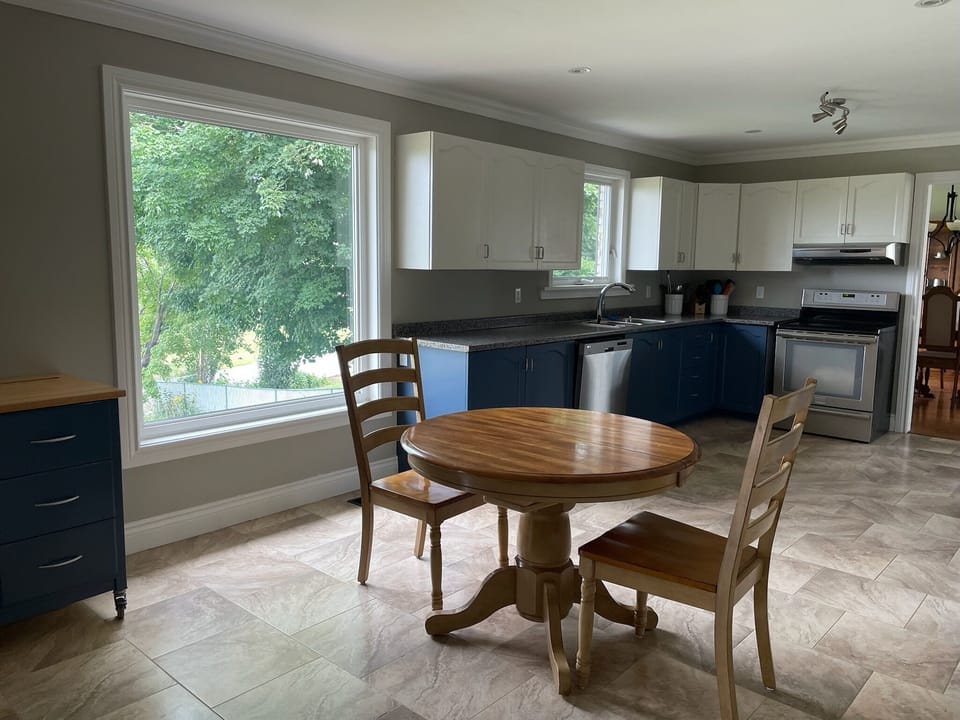 Kitchen table extends and includes 6 chairs. 