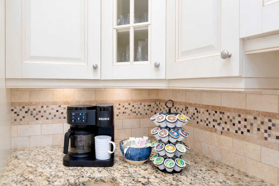Brew your favorite cup and ease into the day—our coffee bar is stocked and ready for slow mornings and ocean-inspired vibes.