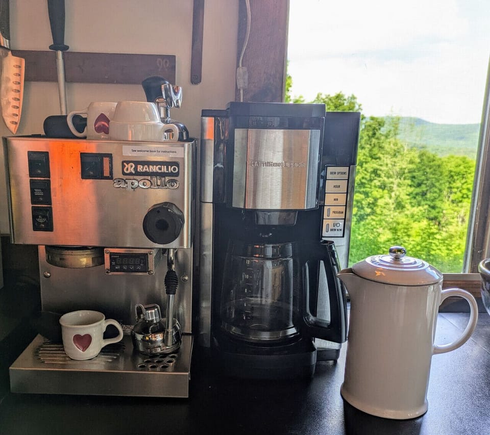 Esspresso machine, drip coffee maker, and french press.