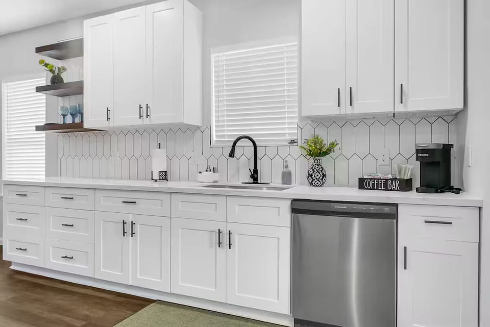 Kitched with utensils and coffee maker