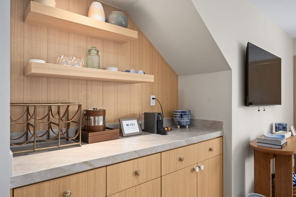 Our dedicated coffee nook is a guest favorite, offering a cozy and convenient spot to enjoy your morning ritual. Equipped with a Keurig, drip coffee maker, mugs, tea, and condiments, this space is stocked with all the essentials.