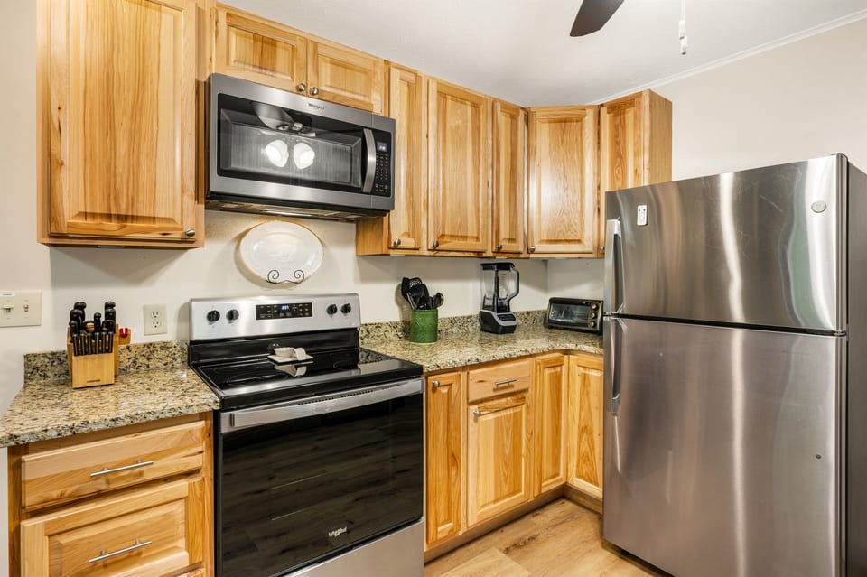 Well-equipped kitchen with stainless appliances, ample counter space, and everything needed to cook real meals. Whether breakfast or dinner, this kitchen is practical, functional, and inviting.