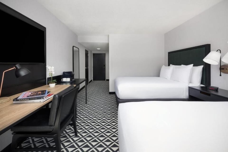 Settle in with a dedicated desk and large TV.