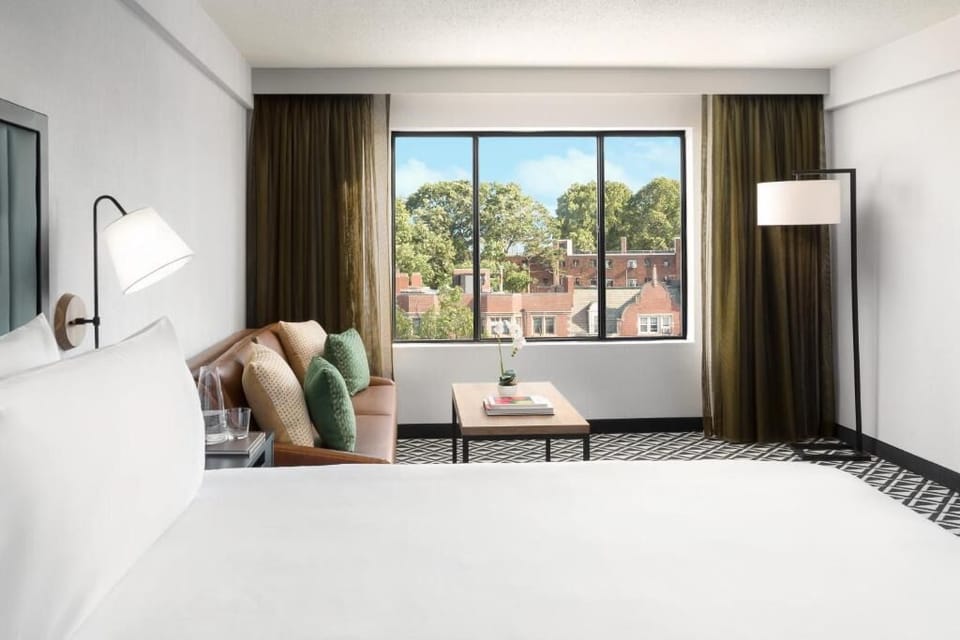 Wake slowly with treetop views framed by oversized windows.