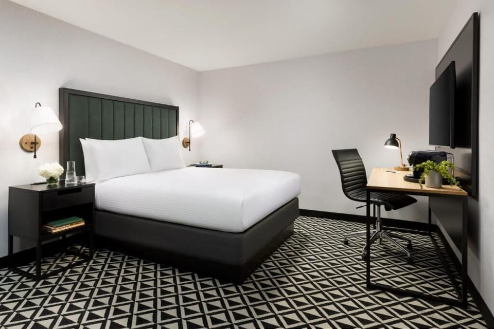 Stretch out on a plush king bed after a busy day.
