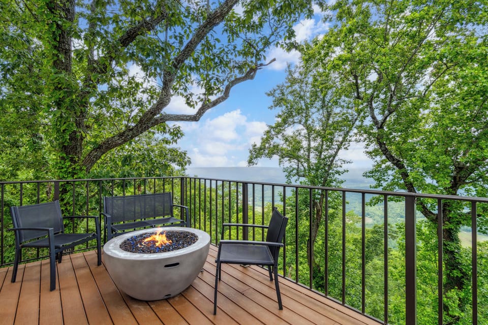 Enjoy the panoramic views of Lookout Valley while relaxing by the fire pit. 