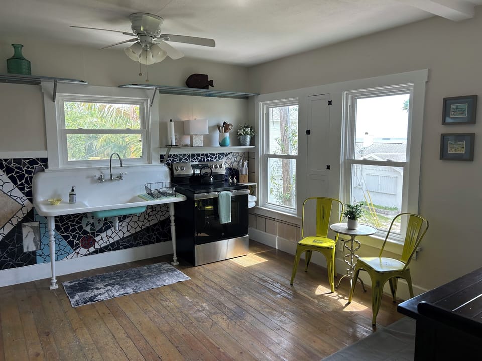 Vintage kitchen with brand new appliances. Water views and historical woodwork.