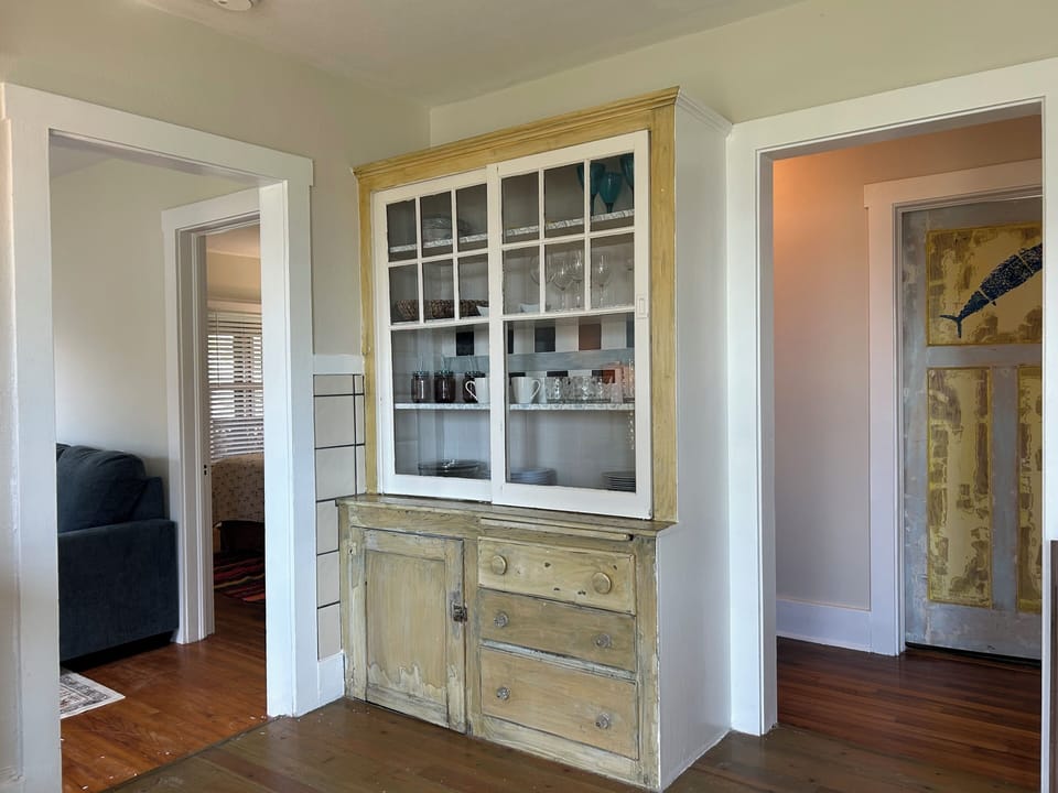 View from kitchen to hall bathroom and living & bed room.