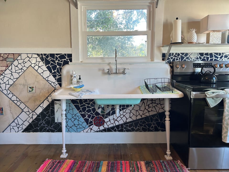 Vintage kitchen with water views, new appliances, Keurig, microwave & toaster.