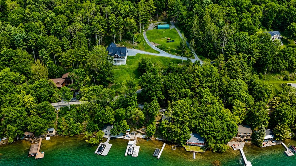 Secluded lakefront retreat with wooded views and private dock—nature and relaxation in one spot! 🌲🏡🌊