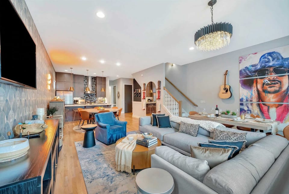 Open-concept living flows into the kitchen and dining room, so the cook stays part of the party and nobody eats alone