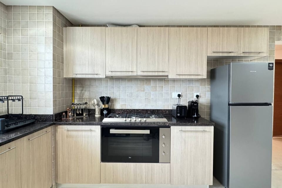 Our well-appointed kitchen combines style and practicality, offering all the tools and space you need to cook, serve, and enjoy meals with ease.