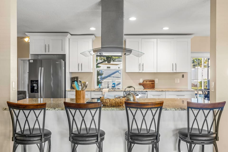 Gather ‘round the large island — where great meals and even better conversations happen. Fully stocked and ready for your culinary adventures!