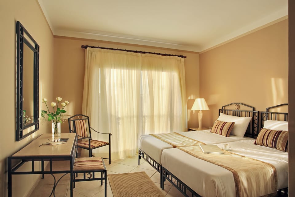 Settle in with a dedicated desk nook and serene bedroom glow.